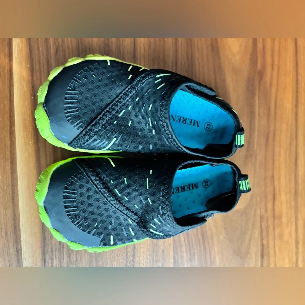 Black and green water shoes